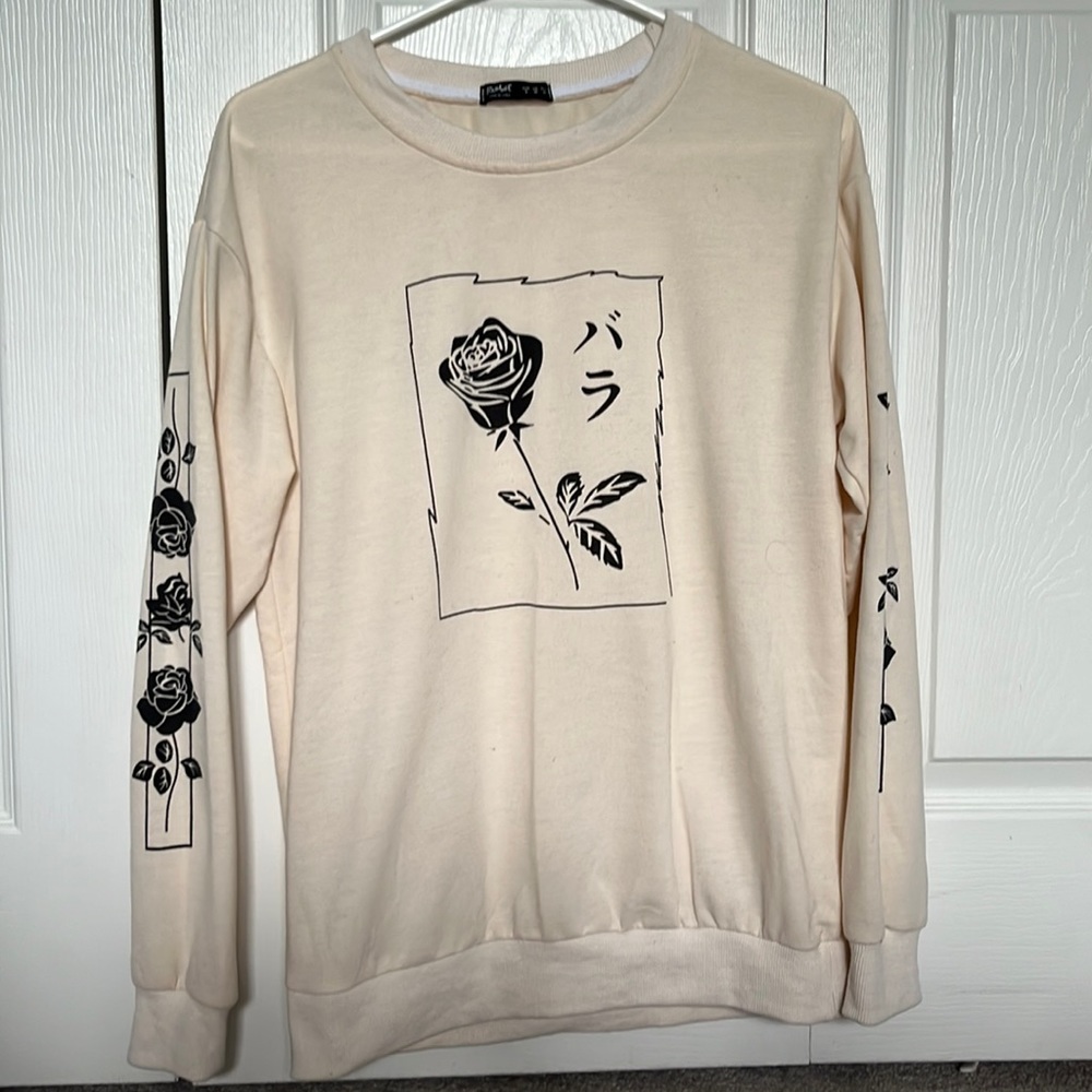 cream colored graphic shirt